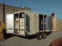 Sound attenuated 350 kW Caterpillar custom built portable generator with trailer and base tank.