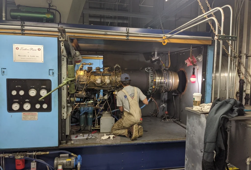 NAPC team member working on the turbine